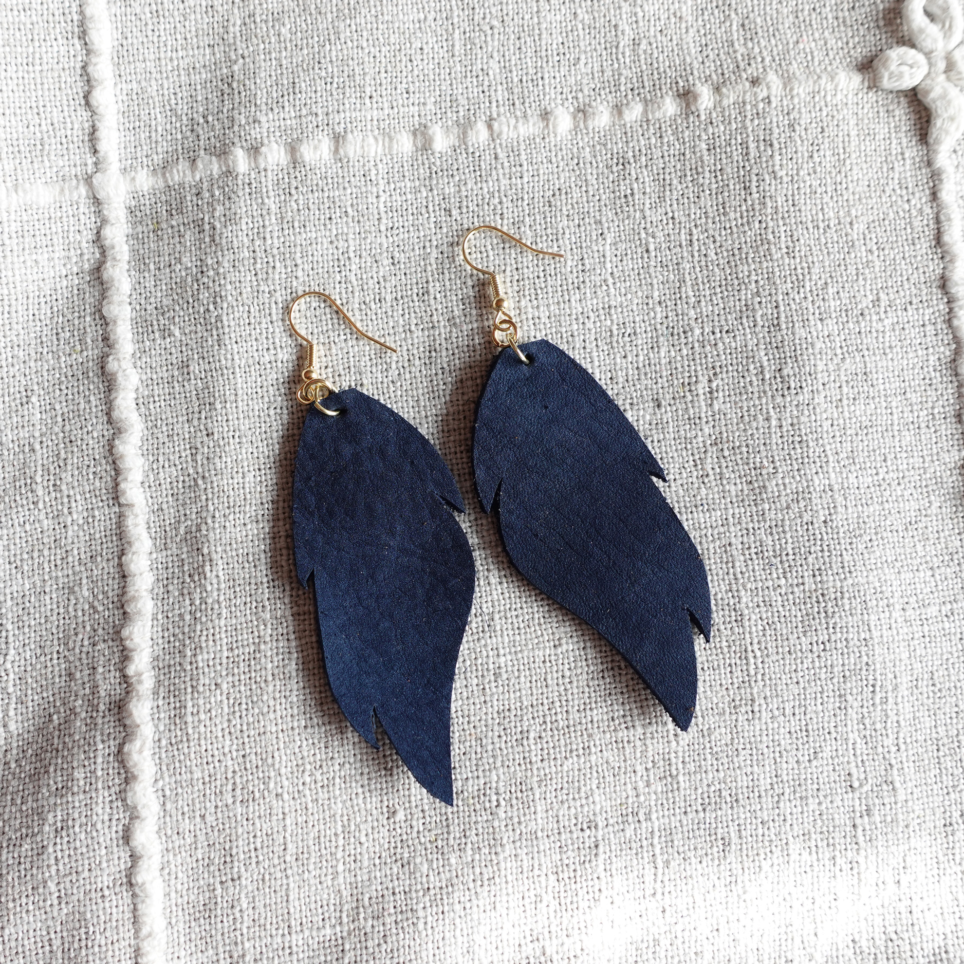 navy feather earrings